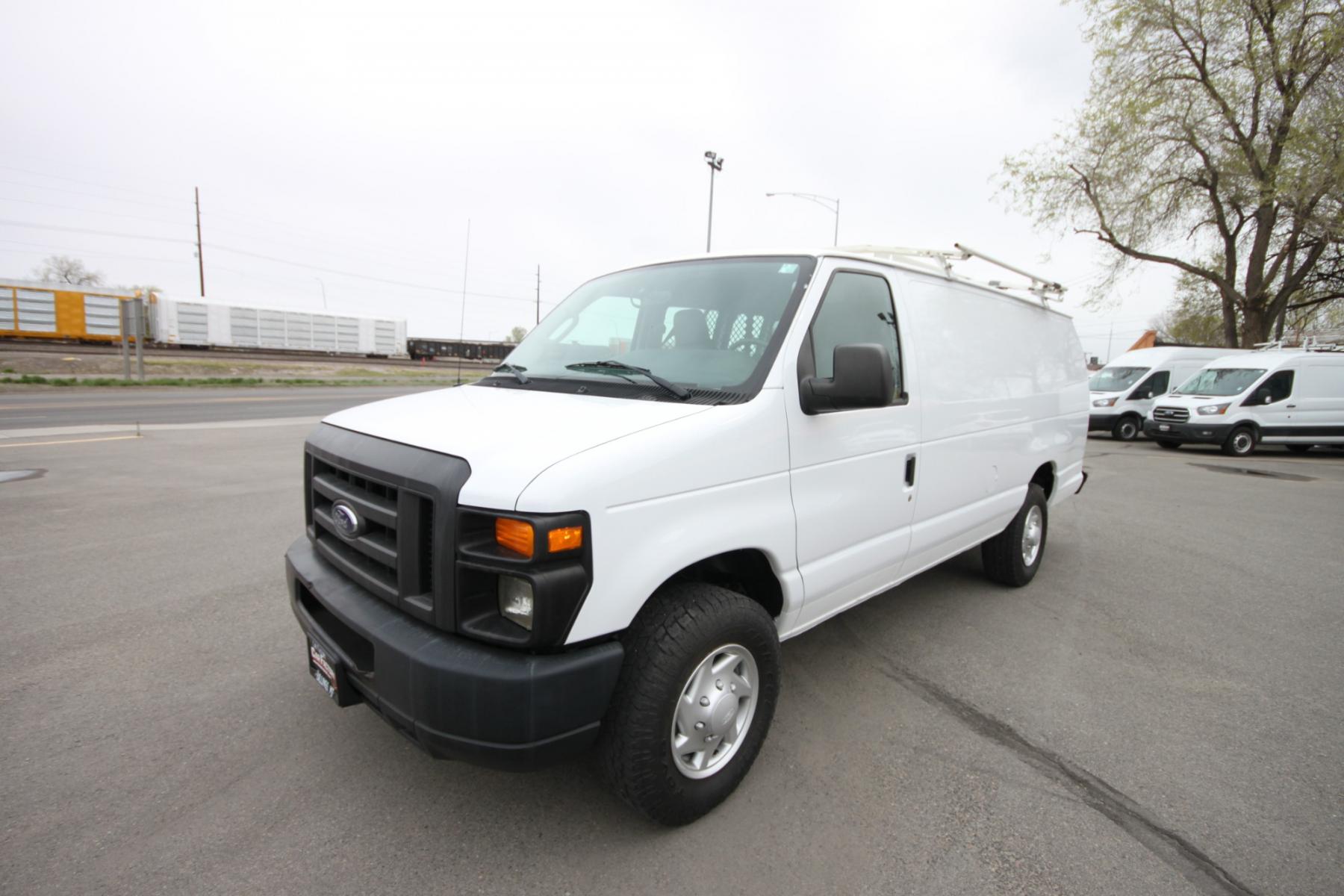 2014 White /Grey Ford E-Series Van (1FTSS3EL3ED) with an 5.4L V8 engine, Automatic transmission, located at 4562 State Avenue, Billings, MT, 59101, (406) 896-9833, 45.769516, -108.526772 - Photo #1